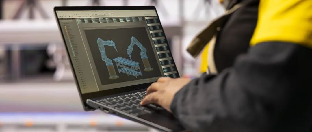 technician-managing-robotic-arms-conveyor-belts-smart-manufacturing-plant.jpg